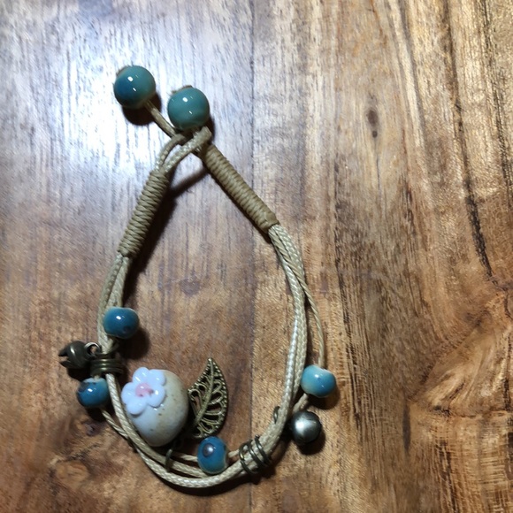 3/$25 Green Bead with Flower and Leaf Charms on Rope Bracelet - Picture 6 of 6